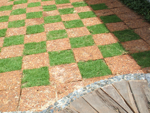 tropical brick and grass terrace landscape design