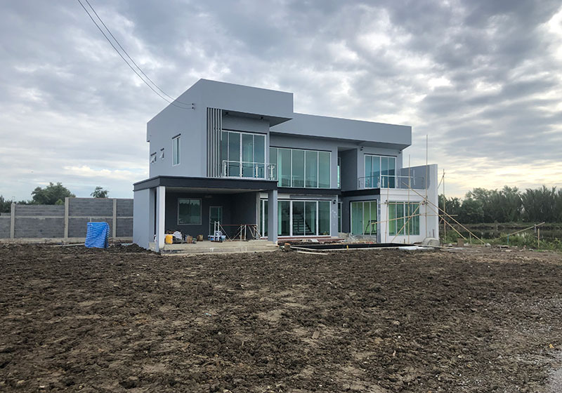 house before landscaping - thailand