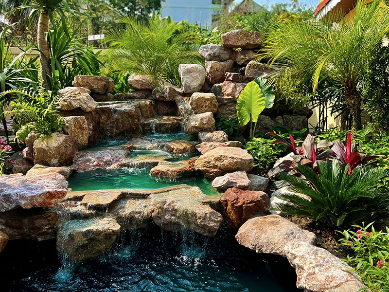 Tropical Rock Waterfall and Pond